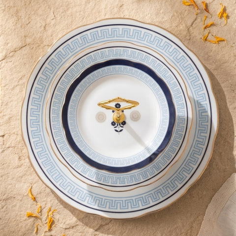 Aegean blue ceramic plates displayed flat showing the printed Greek border design