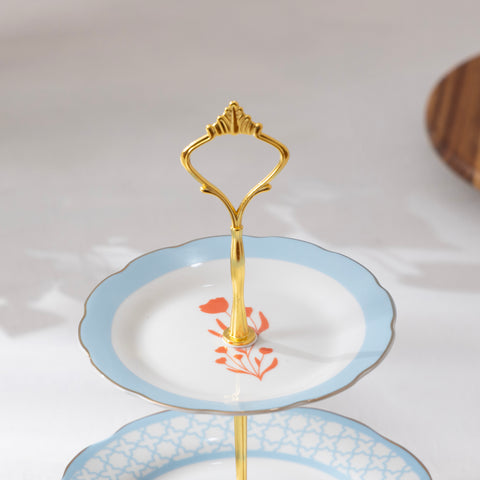 Top view of the tiered cake stand showing the multicolour bloom pattern