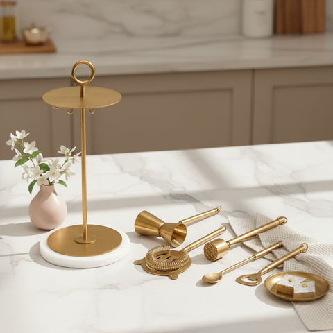 Seven-piece brass bar tool set displayed on its matching brass stand
