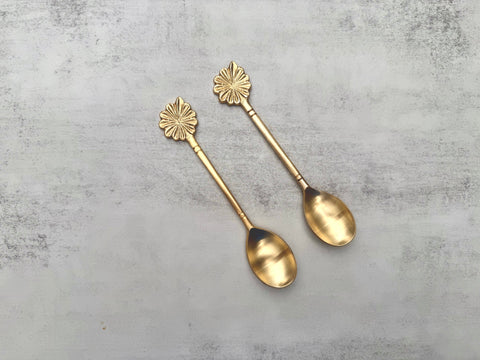 Brass Bloom dessert spoon set with floral handle design top