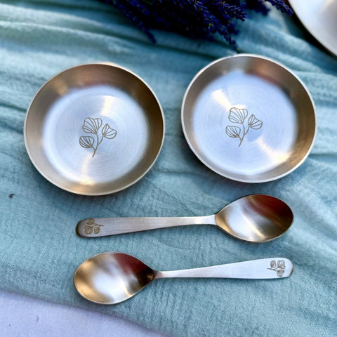 Kansa dessert bowls in bell metal showing the silver-golden sheen and engraving