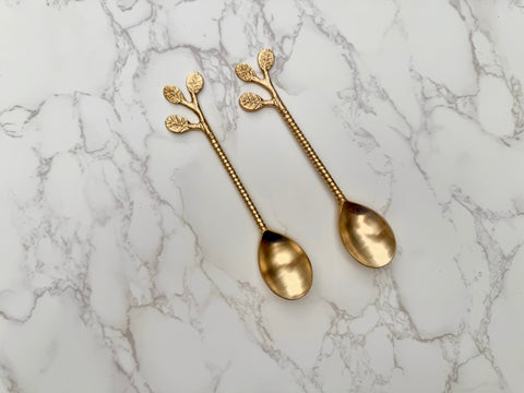 Leaf Bloom brass spoon set with handcrafted leaf handle design top