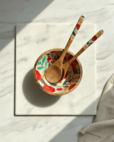 Eight-inch mango wood salad bowl revealing the colourful floral interior design