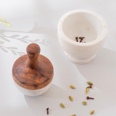 Marble mortar & pestle set with spices inside