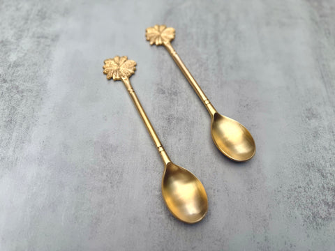 Palm Bloom brass spoon set with palm leaf handle design side
