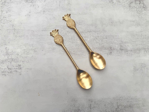 Pineapple Bloom brass spoon set with pineapple handle design front