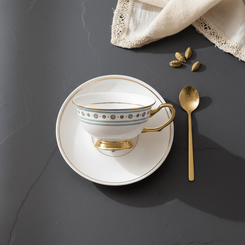Teal Bloom tea cup and saucer set in bone china with teal floral pattern and gold trim