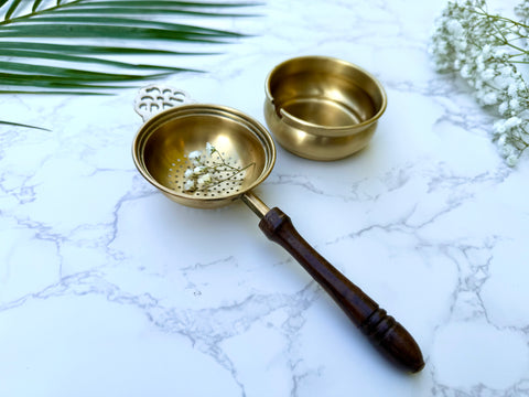 Handcrafted brass tea strainer with wooden handle for Indian chai side