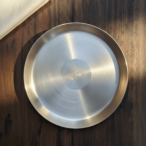 Kansa plate with a delicate Aurevaa logo engraving at the centre in polished bell metal
